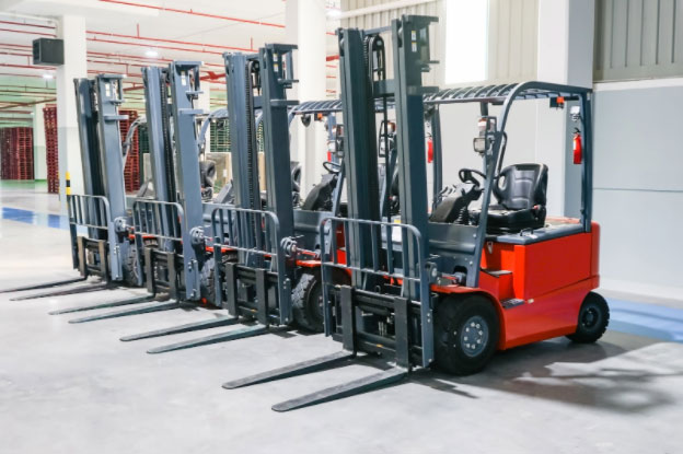 Row of red forklifts for sale